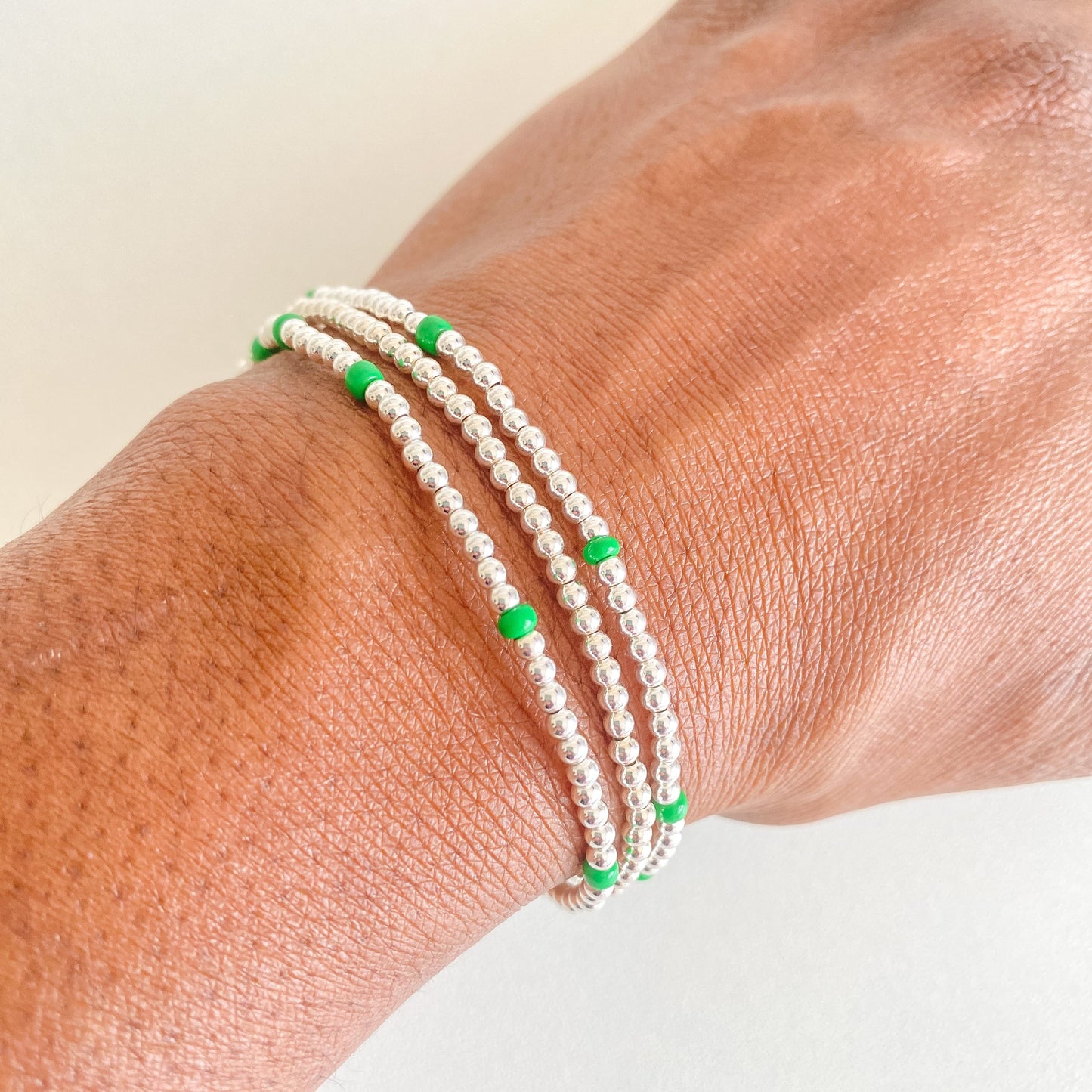 3 sterling silver and green beaded bracelet stack 
